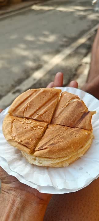 Plate of golden flatbread cut into quarters